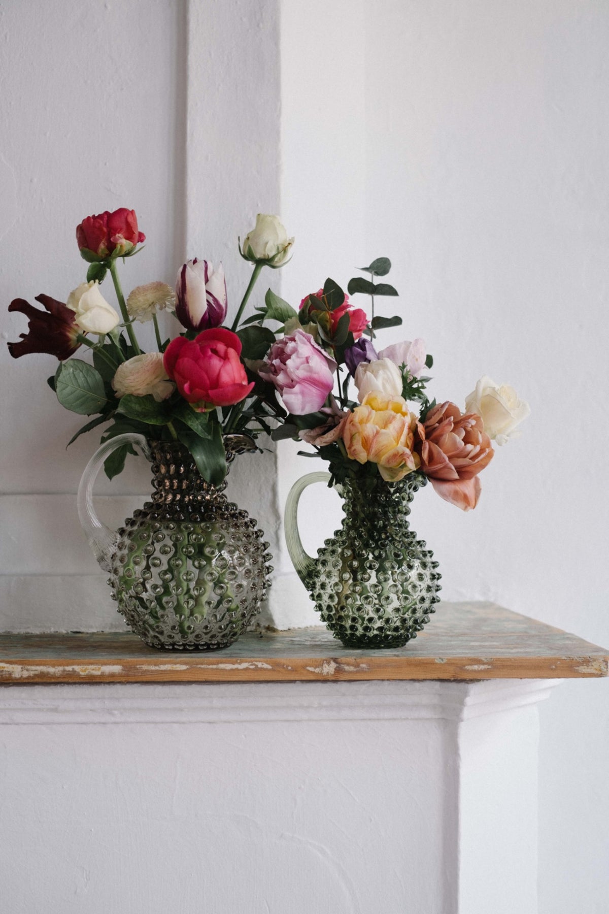 Hobnail glass vases with flowers